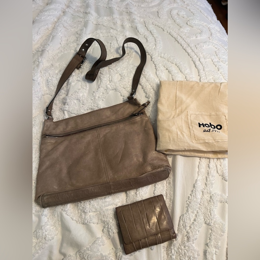 Hobo crossbody with matching wallet and dust bag.